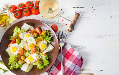 Salad vegetables and quail eggs