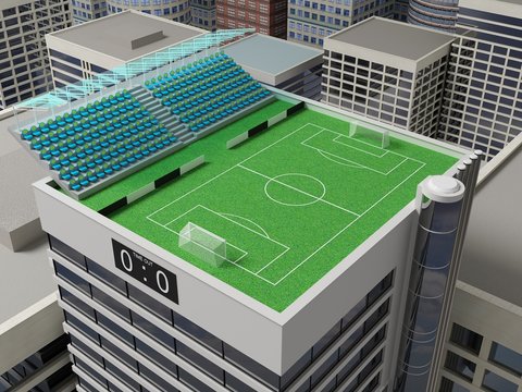 Football. The stadium on the green roof of a skyscraper.