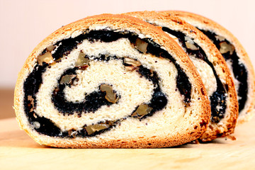 close-up home-made bun with poppy-seed and walnut
