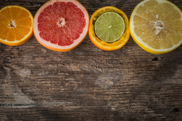Naklejka na ściany i meble Set of sliced citrus fruits lemon, lime, orange, grapefruit with