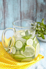 Fruit water in glass pitcher
