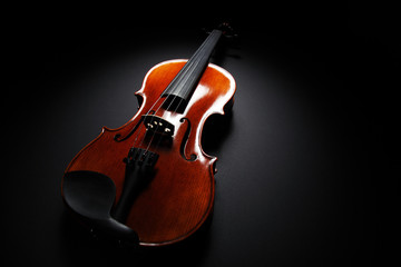 Fototapeta na wymiar Image of violin music instrument on black background