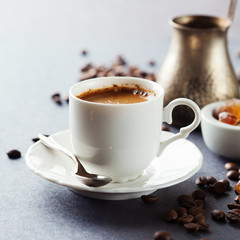 Coffee cup and beans