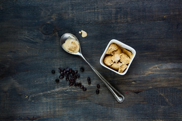 ice cream on dark wooden background.