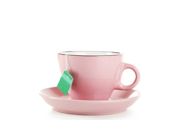 Cup of tea with tea bag isolated on white