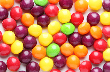 Colorful candies on white background