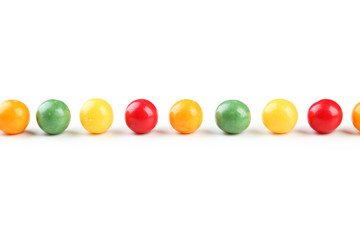 Colorful chewing gums on white background