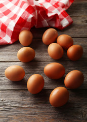 Chicken eggs on grey wooden background