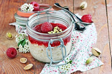 Overnight oats with fresh raspberry and pistachio. 