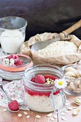 Overnight oats with fresh raspberry and pistachio. 