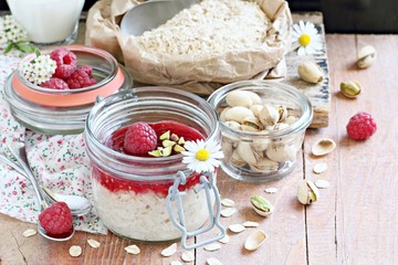 Overnight oats with fresh raspberry and pistachio. 