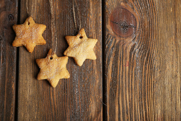 Cookies on brown wooden background