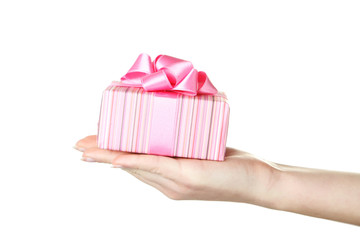Female hand holding gift box on white background