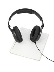 Headphones and notepad