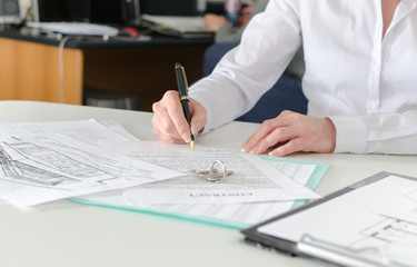 Client signing a real estate contract