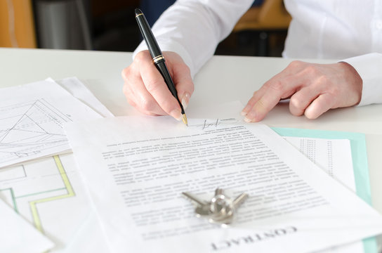 Client signing a real estate contract