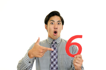 驚いた表情のビジネスマン