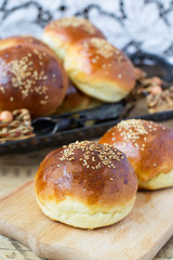 buns for burgers on wooden background