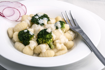 Broccoli gnocchi with cheese sauce