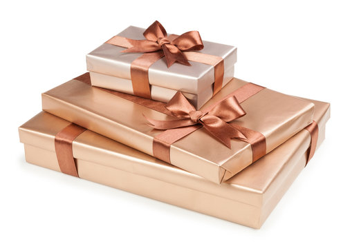 Gold box with gifts and brown bow