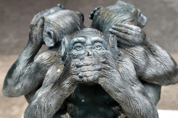 Fototapeta na wymiar Three wise monkeys or Three Mystic Apes sacred ancient icon