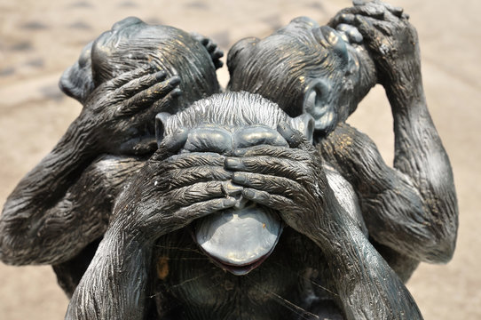 Three wise monkeys or Three Mystic Apes sacred ancient icon