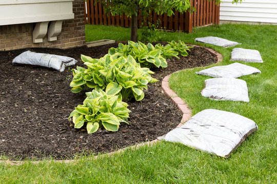 Preparing To Mulch The Garden In Spring