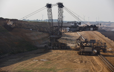 bucket-wheel excavator in open-cast coal mining in germany