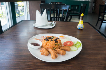 Thai American fire rice on wood table