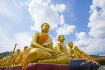 differences image of golden Buddha statue outdoor Thailand