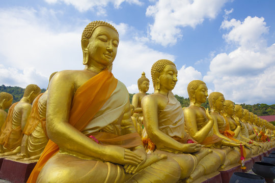 differences image of golden Buddha statue outdoor Thailand