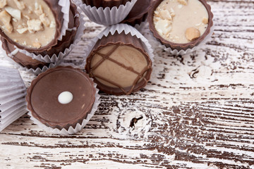 Dark chocolate on wooden background