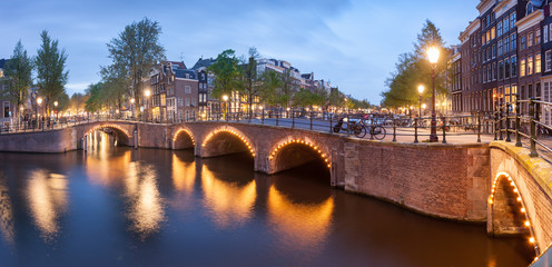 Fototapeta premium Panorama of beautifull Amsterdam canals with bridge, Holland