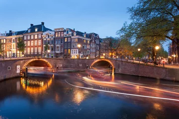 Foto op Plexiglas Beautifull Amsterdam canals with bridge and typical dutch houses © honzahruby