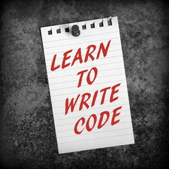 Learn to Write Code reminder pinned to a notice board