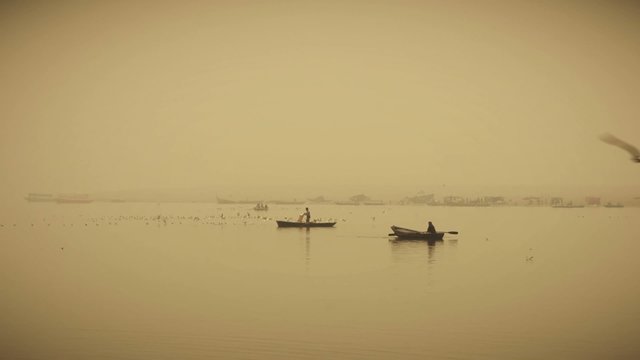 India, small boats on ganges river