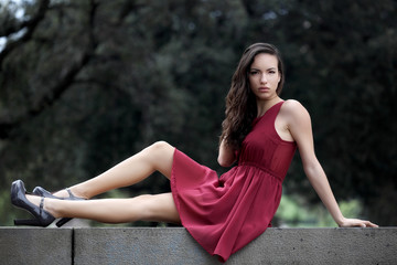 Sensual young woman portrait outdoors in a park