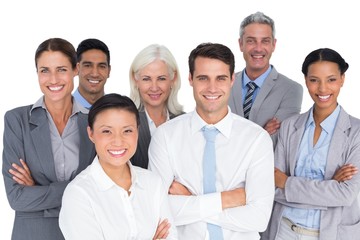 Business people looking at camera with arms crossed