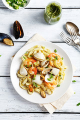 Italian pasta with seafood on plate