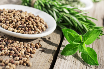 fresh oregano,peppercorns and rosemary