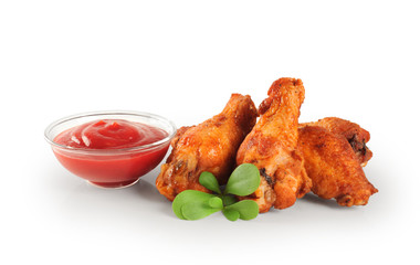 Fried chicken wings and ketchup. Lettuce.