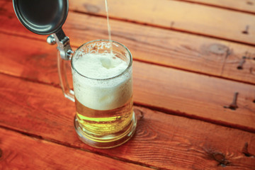 Beer pouring into mug