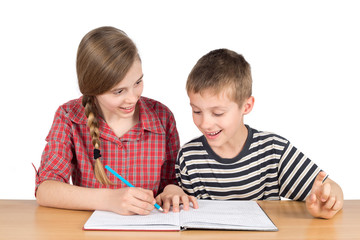 Brother and Sister Solving Math Problems Together Isolated