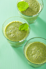 healthy green smoothie with spinach leaves