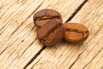 Coffee beans on old table - close up shot