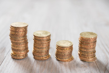 Coins stack in row