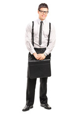 Full length portrait of businessman with a briefcase