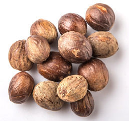 Nutmeg over white background