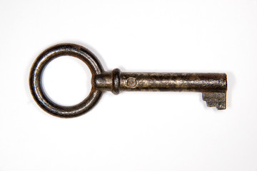 One old keys to the safe on a white background