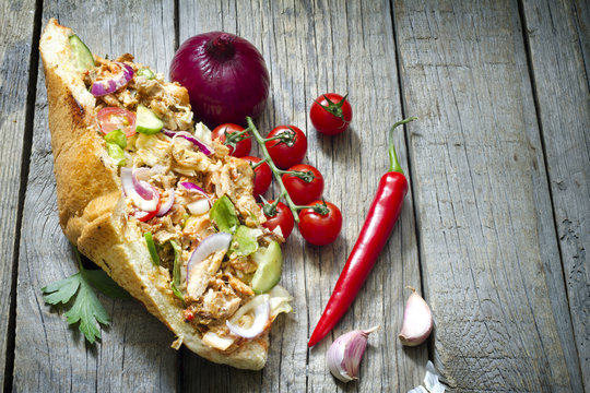 Kebab on old vintage wooden boards with spices